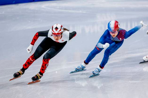 Courtney Sarault of Canada and Cloe Ollivier of France Women s 1000m, Milano Cortina 2026 Winter Olympics: Day 8, Short Track Speed skating, Eisschnelllauf - Milano Cortina 2026 Winter Olympics: Day 8, Milano Speed Skating Stadium, February 14, 2026, Milan, Italy.