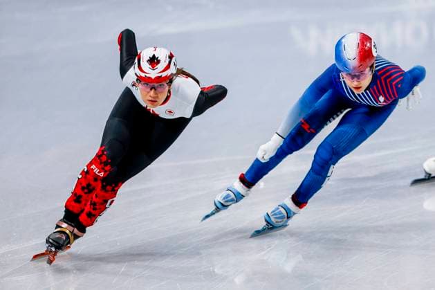 Courtney Sarault of Canada and Cloe Ollivier of France Women s 1000m, Milano Cortina 2026 Winter Olympics: Day 8, Short Track Speed skating, Eisschnelllauf - Milano Cortina 2026 Winter Olympics: Day 8, Milano Speed Skating Stadium, February 14, 2026, Milan, Italy.