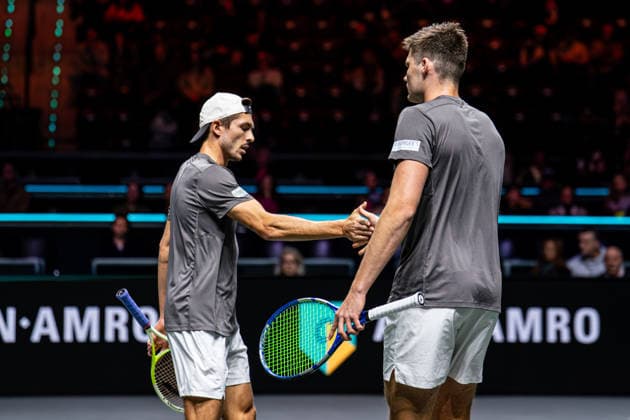 2026-02-14 ABN AMRO Open - Day Six ROTTERDAM, NETHERLANDS - FEBRUARY 14: Jakob Schnaitter, Mark Wallner high five during Day Six of the ABN AMRO Open at Rotterdam Ahoy on February 14, 2026 in Rotterdam, Netherlands. (Photo by Gabriel Calvino Alonso BSR Agency) Rotterdam Netherlands Content not available for redistribution in The Netherlands directly or indirectly through any third parties. Copyright: xBSRxAgencyx