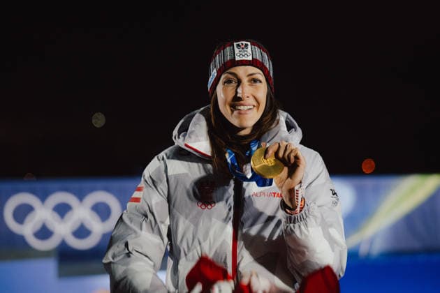 OLYMPICS - Winter Olympic Games, Olympische Spiele, Olympia, OS Milano Cortina 2026 CORTINA D AMPEZZO,ITALY,14.FEB.26 - OLYMPICS, SKELETON - Winter Olympic Games Milano Cortina 2026, women, medal ceremony. Image shows the rejoicing of Janine Flock (AUT). Keywords: medal  GEPAxpictures xAlexanderxSolc