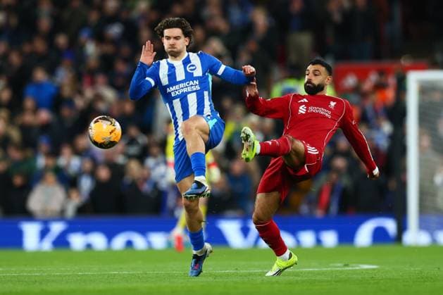 Ferdi Kadioglu of Brighton & Hove Albion and Mohamed Salah of Liverpool Liverpool v Brighton and Hove Albion, Emirates FA Cup, Fourth Round, Football, Anfield, Liverpool, UK - 14 Feb 2026Liverpool Anfield United Kingdom EDITORIAL USE ONLY No use with unauthorised audio, video, data, fixture lists, club league logos or live services. Online in-match use limited to 120 images, no video emulation. No use in betting, games or single club league player publications.  Copyright: xPaulxCurrie Shutterstockx 16608525r