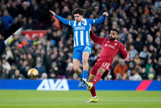 Liverpool v Brighton and Hove Albion, Liverpool, UK - 14 Feb 2026 Mohamed Salah of Liverpool battles for the ball with Ferdi Kadioglu of Brighton and Hove Albion during the Emirates FA Cup match between Liverpool and Brighton and Hove Albion at Anfield, Liverpool on 14 February 2026 ( Liverpool Anfield Liverpool England Copyright: xHarryxCornish PPAUKx PPA-248264