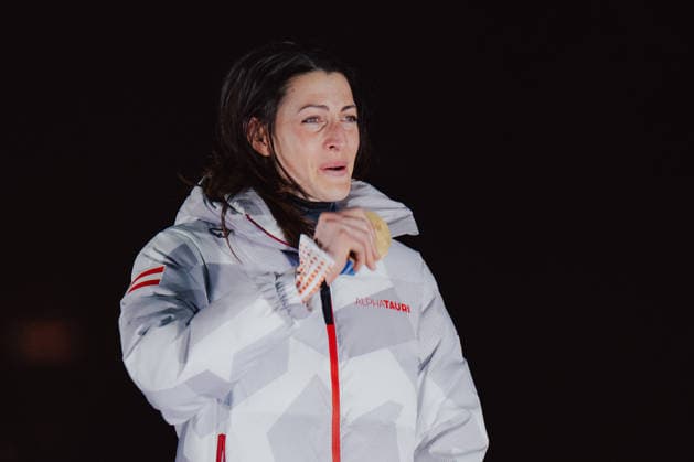 OLYMPICS - Winter Olympic Games, Olympische Spiele, Olympia, OS Milano Cortina 2026 CORTINA D AMPEZZO,ITALY,14.FEB.26 - OLYMPICS, SKELETON - Winter Olympic Games Milano Cortina 2026, women, medal ceremony. Image shows the rejoicing of Janine Flock (AUT). Keywords: medal  GEPAxpictures xAlexanderxSolc