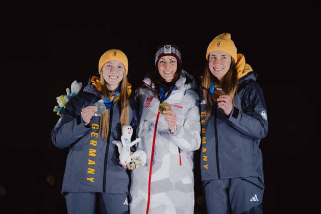 OLYMPICS - Winter Olympic Games, Olympische Spiele, Olympia, OS Milano Cortina 2026 CORTINA D AMPEZZO,ITALY,14.FEB.26 - OLYMPICS, SKELETON - Winter Olympic Games Milano Cortina 2026, women, medal ceremony. Image shows the rejoicing of Susanne Kreher (GER), Janine Flock (AUT) and Jacqueline Pfeifer (GER). Keywords: medal  GEPAxpictures xAlexanderxSolc