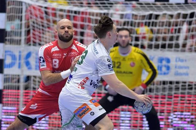Ole Pxregler Frisch Auf Goeppingen 23 on the ball , Adrian Sipos MT Melsungen 8 , Kristof Palasics Goalkeeper MT Melsungen 32 in the back , GER, MT Melsungen Frisch Auf Goeppingen, Handball, 1 Bundesliga, Matchday 21, Season 2025 2026, 14 02 2026, GER, MT Melsungen Frisch Auf Goeppingen, Handball, 1 Bundesliga, Matchday 21, Season 2025 2026, 14 02 2026 Kassel Copyright: xEibner-Pressefotox xRolandxSippelx EP_RSL