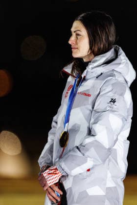 OLYMPICS - Winter Olympic Games, Olympische Spiele, Olympia, OS Milano Cortina 2026 CORTINA D AMPEZZO,ITALY,14.FEB.26 - OLYMPICS, SKELETON - Winter Olympic Games Milano Cortina 2026, women, medal ceremony. Image shows the rejoicing of Janine Flock (AUT). Keyword: medal.  GEPAxpictures xMaticxKlansek