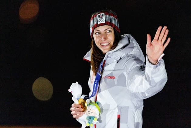 OLYMPICS - Winter Olympic Games, Olympische Spiele, Olympia, OS Milano Cortina 2026 CORTINA D AMPEZZO,ITALY,14.FEB.26 - OLYMPICS, SKELETON - Winter Olympic Games Milano Cortina 2026, women, medal ceremony. Image shows the rejoicing of Janine Flock (AUT). Keyword: medal.  GEPAxpictures xMaticxKlansek