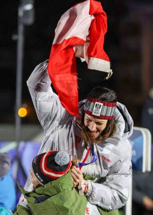 OLYMPICS - Winter Olympic Games, Olympische Spiele, Olympia, OS Milano Cortina 2026 CORTINA D AMPEZZO,ITALY,14.FEB.26 - OLYMPICS, SKELETON - Winter Olympic Games Milano Cortina 2026, women, medal ceremony. Image shows the rejoicing of Janine Flock (AUT).  GEPAxpictures xMaticxKlansek