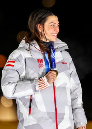 OLYMPICS - Winter Olympic Games, Olympische Spiele, Olympia, OS Milano Cortina 2026 CORTINA D AMPEZZO,ITALY,14.FEB.26 - OLYMPICS, SKELETON - Winter Olympic Games Milano Cortina 2026, women, medal ceremony. Image shows the rejoicing of Janine Flock (AUT).  GEPAxpictures xMaticxKlansek