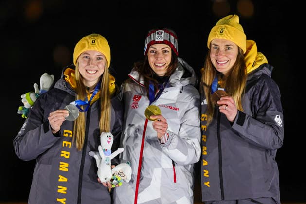 OLYMPICS - Winter Olympic Games, Olympische Spiele, Olympia, OS Milano Cortina 2026 CORTINA D AMPEZZO,ITALY,14.FEB.26 - OLYMPICS, SKELETON - Winter Olympic Games Milano Cortina 2026, women, medal ceremony. Image shows the rejoicing of Susanne Kreher (GER), Janine Flock (AUT) and Jacqueline Pfeifer (GER).  GEPAxpictures xMaticxKlansek