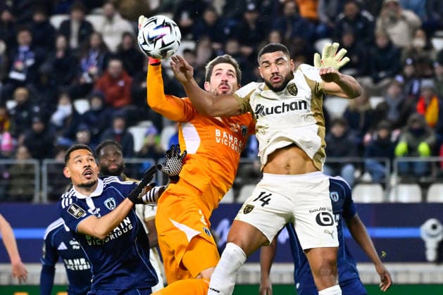 FOOTBALL : Paris FC vs Lens - Ligue 1 - 14 02 2026 Matthieu Udol ( 14 - Lens ) and Kevin Trapp ( 35 - PFC ) during the Ligue 1 match between Paris FC and RC Lens at Stade Jean Bouin on February 14, 2026 in Paris, France. ( Photo by Federico Pestellini PsnewZ ) - ParisFrance  Copyright: xFedericoxPestellinix