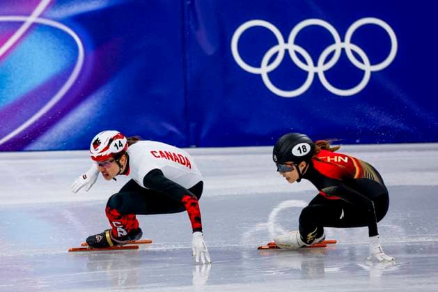 Courtney Sarault of Canada and Li Gong of China Women s 3000m Relay Semifinals, Milano Cortina 2026 Winter Olympics: Day 8, Short Track Speed skating, Eisschnelllauf - Milano Cortina 2026 Winter Olympics: Day 8, Milano Speed Skating Stadium, February 14, 2026, Milan, Italy.