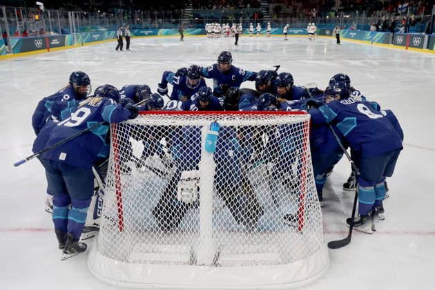 February 14, 2026, Milan, Lombardy, Italy: Team Finland huddles before start of game against Team Switzerland in a women s Ice hockey, Eishockey quarterfinal during the Milano Cortina 2026 Olympic Winter games, Winterspiele,Spiele, Summer games at Milano Rho Ice Hockey Arena. Olympics 2026: Milano Cortina: Ice Hockey-Women Quarterfinal - FIN-SUI  - ZUMAm117 20260214_oly_m117_004 Copyright: xDavidxMcIntyrex