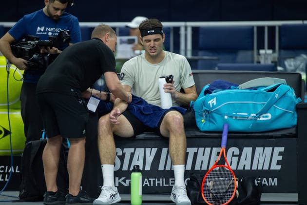 February 14, 2026, Frisco, Texas, USA: TAYLOR FRITZ (USA) is helped by a trainer during a menÃ¢â‚¬â ¢s singles semifinal match at the 2026 Nexo Dallas Open at The Ford Center at The Star in Frisco, Texas. Taylor Fritz advances to the championship match after defeating Marin Cilic, 7:6, 7:6. Tennis 2026: Dallas Open: Taylor Fritz 7:6, 7:6 Marin Cilic  - ZUMAh193 20260214_zsp_h193_038 Copyright: xDanielxMcGregor-Huyerx