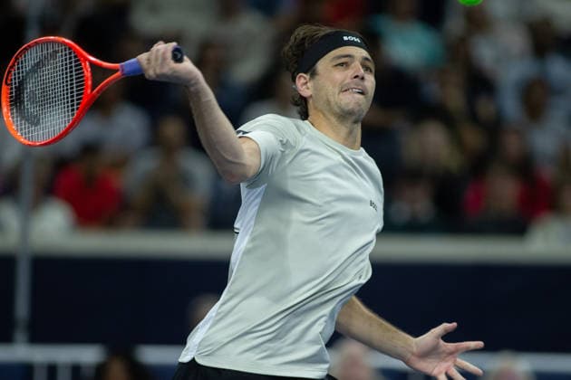 February 14, 2026, Frisco, Texas, USA: TAYLOR FRITZ (USA) volleys during a menÃ¢â‚¬â ¢s singles semifinal match at the 2026 Nexo Dallas Open at The Ford Center at The Star in Frisco, Texas. Taylor Fritz advances to the championship match after defeating Marin Cilic, 7:6, 7:6. Tennis 2026: Dallas Open: Taylor Fritz 7:6, 7:6 Marin Cilic  - ZUMAh193 20260214_zsp_h193_056 Copyright: xDanielxMcGregor-Huyerx