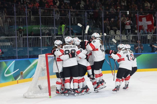 February 14, 2026, Milan, Lombardy, Italy: Team Switzerland celebrates their win over Team Finland in a women s Ice hockey, Eishockey quarterfinal during the Milano Cortina 2026 Olympic Winter games, Winterspiele,Spiele, Summer games at Milano Rho Ice Hockey Arena. Milan Italy - ZUMAm117 20260214_oly_m117_024 Copyright: xDavidxMcIntyrex