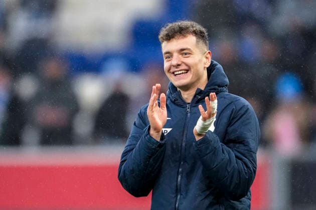 Fisnik Asllani Hoffenheim, 11 , TSG 1899 Hoffenheim player, single image, single photo, action, action, cheering after the final whistle, joy about the victory, winner, winners, cheers, cheering, cheerful, positive, rejoices, happy, optimistic, highlight, 14 02 2026, Sinsheim Germany , Soccer, Bundesliga, TSG 1899 Hoffenheim SC Freiburg, DFB DFL REGULATIONS PROHIBIT ANY USE OF PHOTOGRAPHS AS IMAGE SEQUENCES AND OR QUASI VIDEO xozx