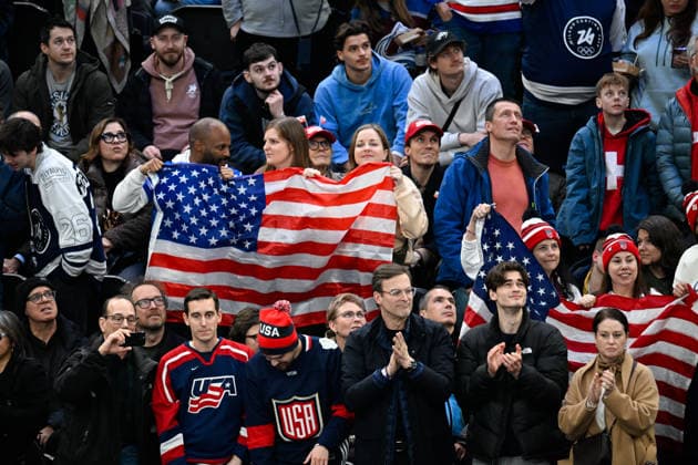 Winter Olympics - Denmark v United States At Hockey Men s Fans of Team USA with the american flag during the men s preliminary round Group C Ice hockey, Eishockey match between USA and Denmark at the Milano Santagiulia Ice Hockey Arena during the Milano Cortina 2026 Winter Olympic Games, Olympische Spiele, Olympia, OS in Milan, Italy on February 14, 2026. Photo by JMP ABACAPRESS.COM Milan Italy  Copyright: xJMP ABACAx