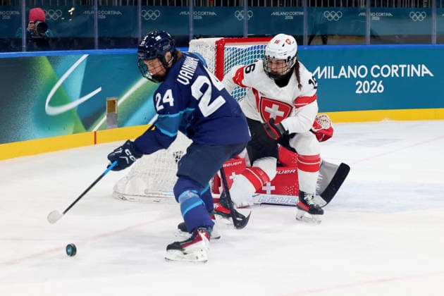February 14, 2026, Milan, Lombardy, Italy: Viivi Vainikka 24 of Team Finland and Nicole Vallario 16 of Team Switzerland in a women s Ice hockey, Eishockey quarterfinal during the Milano Cortina 2026 Olympic Winter games, Winterspiele,Spiele, Summer games at Milano Rho Ice Hockey Arena. Olympics 2026: Milano Cortina: Ice Hockey-Women Quarterfinal - FIN-SUI  - ZUMAm117 20260214_oly_m117_059 Copyright: xDavidxMcIntyrex
