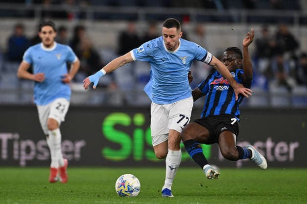 CALCIO - Serie A - SS Lazio vs Atalanta BC Adam Marusic of S.S. Lazio and Kamaldeen Sulemana of Atalanta B.C. are in action during the 25th matchday of the Serie A championship between S.S. Lazio and Atalanta B.C. at the Stadio Olimpico on February 14, 2026 in Rome, Italy. Rome Italy  Copyright: xIPAxSport ABACAx