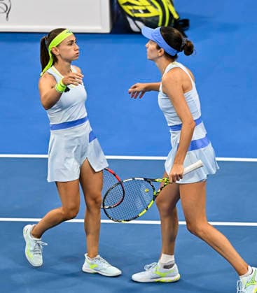 2026 Qatar TotalEnergies Open - Women s Doubles Final match in Doha, Qatar - 14 Feb 2026 Anna Danilina (R) of Kazakhstan and Aleksandra Krunic (L) of Serbia celebrate after winning against Su-Wei Hsieh of Chinese Taipei and Jelena Ostapenko of Latvia (not in view) during their women’s doubles final match at the WTA, Tennis Damen Qatar TotalEnergies Open 2026 tennis tournament at the Khalifa International Tennis Complex. Anna Danilina Aleksandra Krunic won against Su-Wei Hsieh Jelena Ostapenko 0-6,6-4,10-8. Doha Qatar Copyright: xNoushadxVariyattiyakkalx xSOPAxImagesx NVRITYAKAL1-008