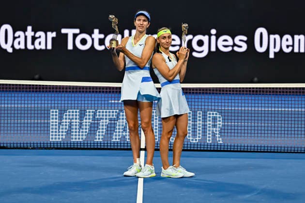 February 14, 2026, Doha, Qatar: Anna Danilina of Kazakhstan and Aleksandra Krunic of Serbia pose with their trophies after winning their Women s Doubles Final match against Su-Wei Hsieh of Chinese Taipei and Jelena Ostapenko of Latvia during the WTA, Tennis Damen Qatar TotalEnergies Open 2026 tennis tournament at the Khalifa International Tennis Complex. Anna Danilina Aleksandra Krunic won against Su-Wei Hsieh Jelena Ostapenko 0-6,6-4,10-8. 2026 Qatar TotalEnergies Open - Women s Doubles Final Match In Doha, Qatar - 14 Feb 2026  - ZUMAs197 20260214_aaa_s197_242 Copyright: xNoushadxVariyattiyakkalx