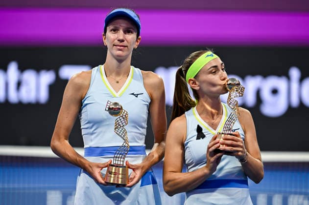February 14, 2026, Doha, Qatar: Anna Danilina of Kazakhstan and Aleksandra Krunic of Serbia pose with their trophies after winning their Women s Doubles Final match against Su-Wei Hsieh of Chinese Taipei and Jelena Ostapenko of Latvia during the WTA, Tennis Damen Qatar TotalEnergies Open 2026 tennis tournament at the Khalifa International Tennis Complex. Anna Danilina Aleksandra Krunic won against Su-Wei Hsieh Jelena Ostapenko 0-6,6-4,10-8. 2026 Qatar TotalEnergies Open - Women s Doubles Final Match In Doha, Qatar - 14 Feb 2026  - ZUMAs197 20260214_aaa_s197_246 Copyright: xNoushadxVariyattiyakkalx