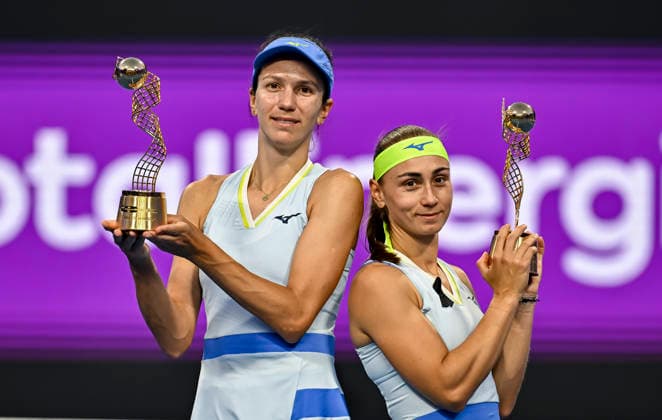 February 14, 2026, Doha, Qatar: Anna Danilina of Kazakhstan and Aleksandra Krunic of Serbia pose with their trophies after winning their Women s Doubles Final match against Su-Wei Hsieh of Chinese Taipei and Jelena Ostapenko of Latvia during the WTA, Tennis Damen Qatar TotalEnergies Open 2026 tennis tournament at the Khalifa International Tennis Complex. Anna Danilina Aleksandra Krunic won against Su-Wei Hsieh Jelena Ostapenko 0-6,6-4,10-8. 2026 Qatar TotalEnergies Open - Women s Doubles Final Match In Doha, Qatar - 14 Feb 2026  - ZUMAs197 20260214_aaa_s197_247 Copyright: xNoushadxVariyattiyakkalx