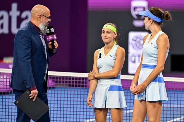 February 14, 2026, Doha, Qatar: Anna Danilina (R) of Kazakhstan and Aleksandra Krunic (C) of Serbia celebrate after winning against Su-Wei Hsieh of Chinese Taipei and Jelena Ostapenko of Latvia during their women™s doubles final match at the WTA, Tennis Damen Qatar TotalEnergies Open 2026 tennis tournament at the Khalifa International Tennis Complex. Anna Danilina Aleksandra Krunic won against Su-Wei Hsieh Jelena Ostapenko 0-6,6-4,10-8. 2026 Qatar TotalEnergies Open - Women s Doubles Final Match In Doha, Qatar - 14 Feb 2026  - ZUMAs197 20260214_aaa_s197_248 Copyright: xNoushadxVariyattiyakkalx