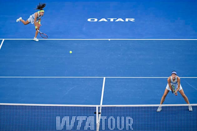 February 14, 2026, Doha, Qatar: Anna Danilina (R) of Kazakhstan and Aleksandra Krunic (L) of Serbia seen in action against Su-Wei Hsieh of Chinese Taipei and Jelena Ostapenko of Latvia (not in view) during their women™s doubles final match at the WTA, Tennis Damen Qatar TotalEnergies Open 2026 tennis tournament at the Khalifa International Tennis Complex. Anna Danilina Aleksandra Krunic won against Su-Wei Hsieh Jelena Ostapenko 0-6,6-4,10-8. 2026 Qatar TotalEnergies Open - Women s Doubles Final Match In Doha, Qatar - 14 Feb 2026  - ZUMAs197 20260214_aaa_s197_249 Copyright: xNoushadxVariyattiyakkalx