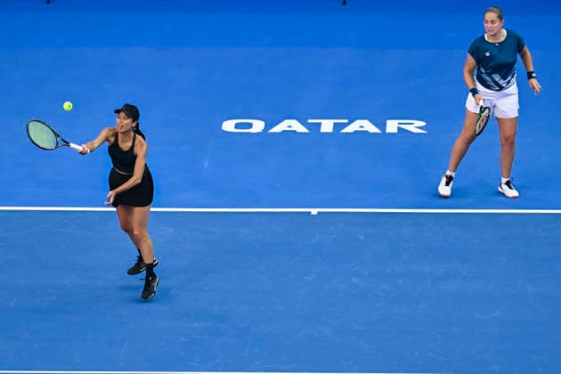 February 14, 2026, Doha, Qatar: Su-Wei Hsieh (L) of Chinese Taipei and Jelena Ostapenko (R) of Latvia seen in action against Anna Danilina of Kazakhstan and Aleksandra Krunic of Serbia (not in view) during their women™s doubles final match at the WTA, Tennis Damen Qatar TotalEnergies Open 2026 tennis tournament at the Khalifa International Tennis Complex. Anna Danilina Aleksandra Krunic won against Su-Wei Hsieh Jelena Ostapenko 0-6,6-4,10-8. 2026 Qatar TotalEnergies Open - Women s Doubles Final Match In Doha, Qatar - 14 Feb 2026  - ZUMAs197 20260214_aaa_s197_254 Copyright: xNoushadxVariyattiyakkalx