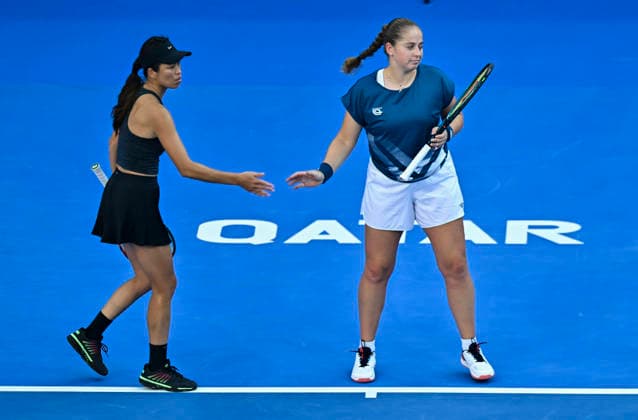 February 14, 2026, Doha, Qatar: Su-Wei Hsieh (L) of Chinese Taipei and Jelena Ostapenko (R) of Latvia celebrate a point against Anna Danilina of Kazakhstan and Aleksandra Krunic of Serbia (not in view) during their women™s doubles final match at the WTA, Tennis Damen Qatar TotalEnergies Open 2026 tennis tournament at the Khalifa International Tennis Complex. Anna Danilina Aleksandra Krunic won against Su-Wei Hsieh Jelena Ostapenko 0-6,6-4,10-8. Doha Qatar - ZUMAs197 20260214_aaa_s197_240 Copyright: xNoushadxVariyattiyakkalx