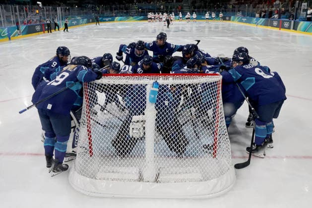 February 14, 2026, Milan, Lombardy, Italy: Team Finland huddles before start of game against Team Switzerland in a women s Ice hockey, Eishockey quarterfinal during the Milano Cortina 2026 Olympic Winter games, Winterspiele,Spiele, Summer games at Milano Rho Ice Hockey Arena. Olympics 2026: Milano Cortina: Ice Hockey-Women Quarterfinal - FIN-SUI  - ZUMAm117 20260214_oly_m117_005 Copyright: xDavidxMcIntyrex