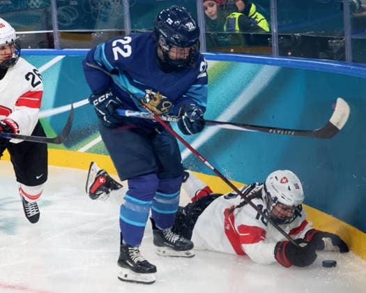 February 14, 2026, Milan, Lombardy, Italy: Julia Schalin 22 of Team Finland and Nicole Vallario 16 of Team Switzerland and Naemi Herzig 26 of Team Switzerland in a women s Ice hockey, Eishockey quarterfinal during the Milano Cortina 2026 Olympic Winter games, Winterspiele,Spiele, Summer games at Milano Rho Ice Hockey Arena. Olympics 2026: Milano Cortina: Ice Hockey-Women Quarterfinal - FIN-SUI  - ZUMAm117 20260214_oly_m117_046 Copyright: xDavidxMcIntyrex