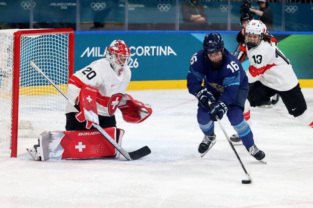 February 14, 2026, Milan, Lombardy, Italy: Petra Nieminen 16 of Team Finland and Andrea Braendli 20 of Team Switzerland and Ivana Wey 13 of Team Switzerland in a women s Ice hockey, Eishockey quarterfinal during the Milano Cortina 2026 Olympic Winter games, Winterspiele,Spiele, Summer games at Milano Rho Ice Hockey Arena. Olympics 2026: Milano Cortina: Ice Hockey-Women Quarterfinal - FIN-SUI  - ZUMAm117 20260214_oly_m117_055 Copyright: xDavidxMcIntyrex