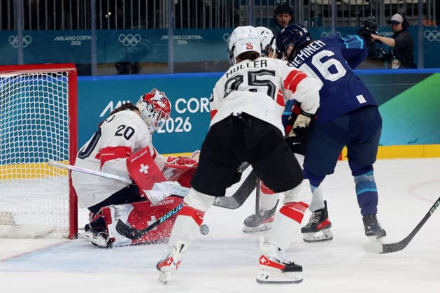 February 14, 2026, Milan, Lombardy, Italy: Petra Nieminen 16 of Team Finland has shot blocked by goalie Andrea Braendli 20 of Team Switzerland in a women s Ice hockey, Eishockey quarterfinal during the Milano Cortina 2026 Olympic Winter games, Winterspiele,Spiele, Summer games at Milano Rho Ice Hockey Arena. Milan Italy - ZUMAm117 20260214_oly_m117_010 Copyright: xDavidxMcIntyrex
