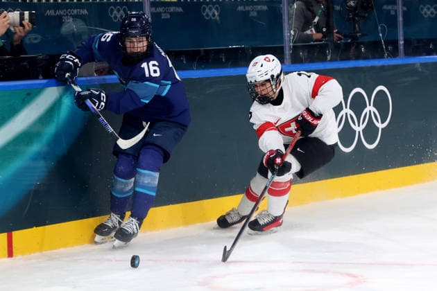 February 14, 2026, Milan, Lombardy, Italy: Petra Nieminen 16 of Team Finland and Lara Christen 17 of Team Switzerland in a women s Ice hockey, Eishockey quarterfinal during the Milano Cortina 2026 Olympic Winter games, Winterspiele,Spiele, Summer games at Milano Rho Ice Hockey Arena. Milan Italy - ZUMAm117 20260214_oly_m117_058 Copyright: xDavidxMcIntyrex