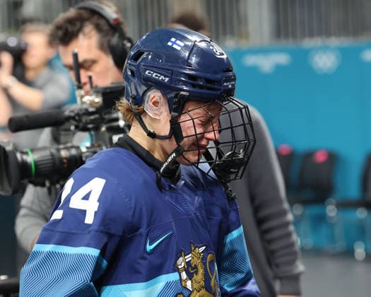 February 14, 2026, Milan, Lombardy, Italy: Viivi Vainikka 24 of Team Finland after losing to Team Switzerland in a women s Ice hockey, Eishockey quarterfinal during the Milano Cortina 2026 Olympic Winter games, Winterspiele,Spiele, Summer games at Milano Rho Ice Hockey Arena. Milan Italy - ZUMAm117 20260214_oly_m117_036 Copyright: xDavidxMcIntyrex