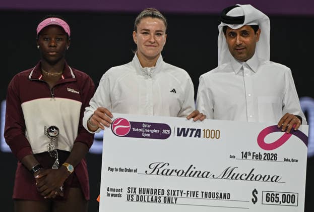 Qatar TotalEnergies Open 2026 - Singles Final DOHA, QATAR FEBRUARY 14: Singles champion Karolina Muchova (C) of the Czech Republic stands with runner-up Victoria Mboko of Canada and Nasser Al-Khelaifi, President of the Qatar Tennis Federation, during the trophy ceremony for the 2026 Qatar TotalEnergies Open at the Khalifa International Tennis and Squash Complex in Doha, Qatar, February 14, 2026. Doha Qatar  Copyright: xArturxWidakx originalFilename:widak-qatartot260214_npYZH.jpg