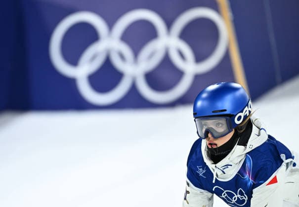 260214 -- LIVIGNO, Feb. 14, 2026 -- Gu Ailing of China reacts during the free skiing women s freeski big air qualification at the Milan-Cortina 2026 Olympic Winter games, Winterspiele,Spiele, Summer games in Livigno, Italy, Feb. 14, 2026. MICO2026ITALY-LIVIGNO-OLYMPIC WINTER GAMES-FREESTYLE SKIING-WOMEN S FREESKI BIG AIR-QUALIFICATION ZhangxHongxiang  (MICO2026)ITALY-LIVIGNO-OLYMPIC WINTER GAMES-FREESTYLE SKIING-WOMEN S FREESKI BIG AIR-QUALIFICATION IMAGO ZhangxHongxiang  imago images 0847598979