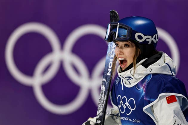 260214 -- LIVIGNO, Feb. 14, 2026 -- Gu Ailing of China reacts during the free skiing women s freeski big air qualification at the Milan-Cortina 2026 Olympic Winter games, Winterspiele,Spiele, Summer games in Livigno, Italy, Feb. 14, 2026. MICO2026ITALY-LIVIGNO-OLYMPIC WINTER GAMES-FREESTYLE SKIING-WOMEN S FREESKI BIG AIR-QUALIFICATION WangxPeng  (MICO2026)ITALY-LIVIGNO-OLYMPIC WINTER GAMES-FREESTYLE SKIING-WOMEN S FREESKI BIG AIR-QUALIFICATION IMAGO WangxPeng  imago images 0847599029