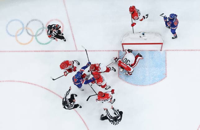 (260215) -- MILAN, Feb. 15, 2026 -- Players clash during the Ice hockey, Eishockey men s preliminary round group C match between the United States and Denmark of the Milan-Cortina 2026 Olympic Winter games, Winterspiele,Spiele, Summer games in Milan, Italy, Feb. 14, 2026. ) (MICO2026)ITALY-MILAN-OLYMPIC WINTER GAMES-ICE HOCKEY-MEN-PRELIMINARY-USA VS DEN ZhangxHaofu 