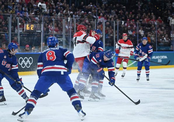 (260215) -- MILAN, Feb. 15, 2026 -- Auston Matthews (C) and Matt Boldy (3rd R) of the United States vie with Nikolaj Ehlers (3rd L) of Denmark during the Ice hockey, Eishockey men s preliminary round group C match between the United States and Denmark of the Milan-Cortina 2026 Olympic Winter games, Winterspiele,Spiele, Summer games in Milan, Italy, Feb. 14, 2026. ) (MICO2026)ITALY-MILAN-OLYMPIC WINTER GAMES-ICE HOCKEY-MEN-PRELIMINARY-USA VS DEN ZhangxHaofu 