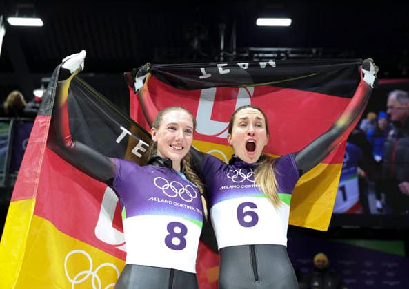 (260215) -- CORTINA D AMPEZZO, Feb. 15, 2026 -- Silver medalist Susanne Kreher (L) of Germany and bronze medalist Jacqueline Pfeifer of Germany celebrate after the skeleton women s heat at the Milan-Cortina 2026 Olympic Winter games, Winterspiele,Spiele, Summer games in Cortina, Italy, Feb. 14, 2026. ) (MICO2026)ITALY-CORTINA D AMPEZZO-OLYMPIC WINTER GAMES-SKELETON-WOMEN DingxXu 