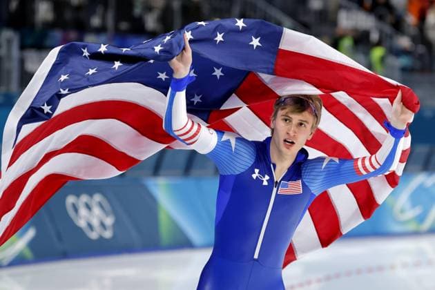 Milan Cortina Olympics: Speed skating, Eisschnelllauf American speed skater Jordan Stolz celebrates after winning gold in the men s 500 meters at the Milan Cortina Olympics on Feb. 14, 2026, at Milano Speed Skating Stadium in Milan.  A14AA0005286334P