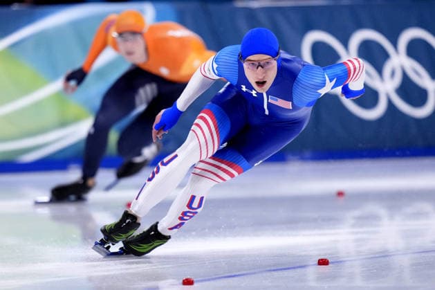 Milan Cortina Olympics: Speed skating, Eisschnelllauf American speed skater Jordan Stolz (front) competes en route to winning gold in the men s 500 meters at the Milan Cortina Olympics on Feb. 14, 2026, at Milano Speed Skating Stadium in Milan.  A14AA0005286507P