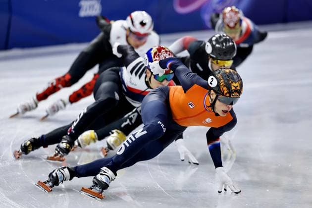 Milan Cortina Olympics: Short track Speed skating, Eisschnelllauf Jens van t Wout (front) of the Netherlands races to gold in the men s 1,500-meter short track speed skating final at the Milan Cortina Olympics on Feb. 14, 2026, at Milano Ice Skating Arena in Milan.  A14AA0005286832P