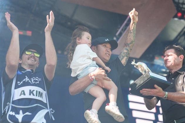LIV GOLF ADELAIDE, Anthony Kim of 4Aces GC with daughter Bella after victory during Round 4 of the LIV Golf Adelaide at The Grange Golf Club in Adelaide, Sunday, February 15, 2026. ( NO ARCHIVING, EDITORIAL USE ONLY ADELAIDE SA AUSTRALIA  Copyright: xMATTxTURNERx 20260215144127114630