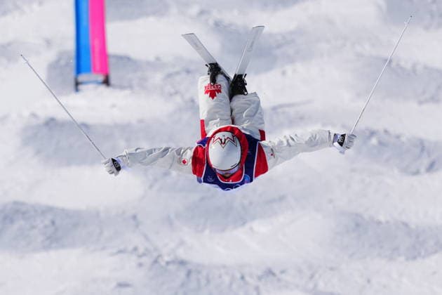 February 15, 2026, Livigno, Italy: Canada s Mikael Kingsbury competes during the men s dual moguls 1 8 final at the Milano Cortina 2026 Winter Olympic Games, Olympische Spiele, Olympia, OS in Livigno, Italy on Sunday, Feb. 15, 2026. Canada News - February 15, 2026  - ZUMAc35_ 20260215_zaf_c35_002 Copyright: xSeanxKilpatrickx