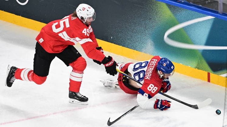 XXV Winter Olympic Games, Olympische Spiele, Olympia, OS in Milan, Italy, on February 15, 2026. Men s Ice hockey, Eishockey Group A, Switzerland vs Czech Republic. From left: Michael Fora (SUI) and David Pastrnak (CZE). (CTKxPhoto MichalxKamaryt) CTKPhotoP2026021502737  CTKPhotoP2026021502737